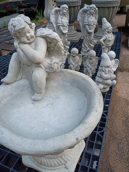 Cherub birdbath set with angel and gnome statues in Villa Rica, GA